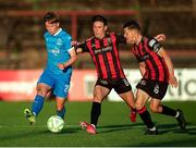 2 May 2025; Conan Noonan of Waterford in action against Dayle Rooney and Keith Buckley of Bohemians during the SSE Airtricity Men's Premier Division match between Bohemians and Waterford at Dalymount Park in Dublin. Photo by Michael P Ryan/Sportsfile
