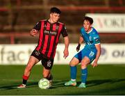 2 May 2025; James Clarke of Bohemians in action against Sam Glenfield of Waterford during the SSE Airtricity Men's Premier Division match between Bohemians and Waterford at Dalymount Park in Dublin. Photo by Michael P Ryan/Sportsfile