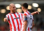 2 May 2025; Derry City's Michael Duffy, right, is congratulated by team-mate Mark Connolly after scoring his side's first goal during the SSE Airtricity Men's Premier Division match between Derry City and Shelbourne at The Ryan McBride Brandywell Stadium in Derry. Photo by Stephen McCarthy/Sportsfile