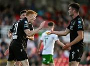 2 May 2025; Rory Gaffney of Shamrock Rovers celebrates with teammate Josh Honohan, right, after scoring their side's first goal during the SSE Airtricity Men's Premier Division match between Cork City and Shamrock Rovers at Turner's Cross in Cork. Photo by Brendan Moran/Sportsfile