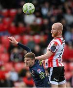 2 May 2025; Liam Boyce of Derry City in action against Sean Gannon of Shelbourne during the SSE Airtricity Men's Premier Division match between Derry City and Shelbourne at The Ryan McBride Brandywell Stadium in Derry. Photo by Stephen McCarthy/Sportsfile
