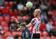 2 May 2025; Liam Boyce of Derry City in action against Sean Gannon of Shelbourne during the SSE Airtricity Men's Premier Division match between Derry City and Shelbourne at The Ryan McBride Brandywell Stadium in Derry. Photo by Stephen McCarthy/Sportsfile