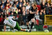 2 May 2025; Rory Gaffney of Shamrock Rovers is tackled by Charlie Lyons of Cork City during the SSE Airtricity Men's Premier Division match between Cork City and Shamrock Rovers at Turner's Cross in Cork. Photo by Brendan Moran/Sportsfile