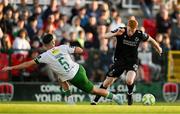 2 May 2025; Rory Gaffney of Shamrock Rovers is tackled by Charlie Lyons of Cork City during the SSE Airtricity Men's Premier Division match between Cork City and Shamrock Rovers at Turner's Cross in Cork. Photo by Brendan Moran/Sportsfile