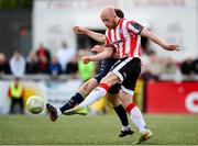 2 May 2025; Liam Boyce of Derry City shoots to score his side's second goal during the SSE Airtricity Men's Premier Division match between Derry City and Shelbourne at The Ryan McBride Brandywell Stadium in Derry. Photo by Stephen McCarthy/Sportsfile