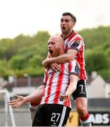 2 May 2025; Derry City's Liam Boyce is congratulated by team-mate Michael Duffy after scoring their side's second goal during the SSE Airtricity Men's Premier Division match between Derry City and Shelbourne at The Ryan McBride Brandywell Stadium in Derry. Photo by Stephen McCarthy/Sportsfile