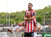 2 May 2025; Derry City's Liam Boyce is congratulated by team-mate Michael Duffy after scoring their side's second goal during the SSE Airtricity Men's Premier Division match between Derry City and Shelbourne at The Ryan McBride Brandywell Stadium in Derry. Photo by Stephen McCarthy/Sportsfile