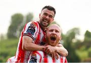 2 May 2025; Derry City's Liam Boyce is congratulated by team-mate Michael Duffy after scoring their side's second goal during the SSE Airtricity Men's Premier Division match between Derry City and Shelbourne at The Ryan McBride Brandywell Stadium in Derry. Photo by Stephen McCarthy/Sportsfile