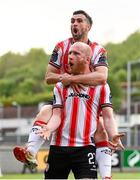 2 May 2025; Derry City's Liam Boyce is congratulated by team-mate Michael Duffy after scoring their side's second goal during the SSE Airtricity Men's Premier Division match between Derry City and Shelbourne at The Ryan McBride Brandywell Stadium in Derry. Photo by Stephen McCarthy/Sportsfile