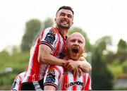 2 May 2025; Derry City's Liam Boyce is congratulated by team-mate Michael Duffy after scoring their side's second goal during the SSE Airtricity Men's Premier Division match between Derry City and Shelbourne at The Ryan McBride Brandywell Stadium in Derry. Photo by Stephen McCarthy/Sportsfile