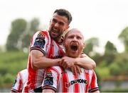 2 May 2025; Derry City's Liam Boyce is congratulated by team-mate Michael Duffy after scoring their side's second goal during the SSE Airtricity Men's Premier Division match between Derry City and Shelbourne at The Ryan McBride Brandywell Stadium in Derry. Photo by Stephen McCarthy/Sportsfile