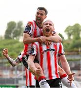 2 May 2025; Derry City's Liam Boyce is congratulated by team-mate Michael Duffy after scoring their side's second goal during the SSE Airtricity Men's Premier Division match between Derry City and Shelbourne at The Ryan McBride Brandywell Stadium in Derry. Photo by Stephen McCarthy/Sportsfile