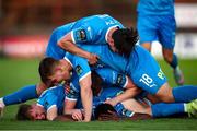 2 May 2025; James Olayinka of Waterford, bottom, is congratulated by teammates after scoring his sides first goal during the SSE Airtricity Men's Premier Division match between Bohemians and Waterford at Dalymount Park in Dublin. Photo by Michael P Ryan/Sportsfile