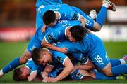 2 May 2025; James Olayinka of Waterford, bottom, is congratulated by teammates after scoring his sides first goal during the SSE Airtricity Men's Premier Division match between Bohemians and Waterford at Dalymount Park in Dublin. Photo by Michael P Ryan/Sportsfile
