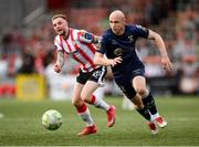 2 May 2025; Kerr McInroy of Shelbourne in action against Carl Winchester of Derry City during the SSE Airtricity Men's Premier Division match between Derry City and Shelbourne at The Ryan McBride Brandywell Stadium in Derry. Photo by Stephen McCarthy/Sportsfile
