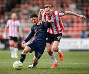 2 May 2025; Kevin Holt of Derry City in action against Ali Coote of Shelbourne during the SSE Airtricity Men's Premier Division match between Derry City and Shelbourne at The Ryan McBride Brandywell Stadium in Derry. Photo by Stephen McCarthy/Sportsfile