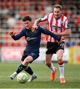 2 May 2025; Kevin Holt of Derry City in action against Ali Coote of Shelbourne during the SSE Airtricity Men's Premier Division match between Derry City and Shelbourne at The Ryan McBride Brandywell Stadium in Derry. Photo by Stephen McCarthy/Sportsfile