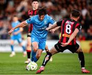 2 May 2025; Grant Horton of Waterford in action against Dayle Rooney of Bohemians during the SSE Airtricity Men's Premier Division match between Bohemians and Waterford at Dalymount Park in Dublin. Photo by Michael P Ryan/Sportsfile