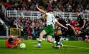 2 May 2025; Shamrock Rovers goalkeeper Ed McGinty makes a save from Cathal O'Sullivan of Cork City and Roberto Lopes of Shamrock Rovers during the SSE Airtricity Men's Premier Division match between Cork City and Shamrock Rovers at Turner's Cross in Cork. Photo by Brendan Moran/Sportsfile