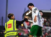 2 May 2025; Freddie Anderson of Cork City, right, celebrates with a ballboy after scoring their side's first goal during the SSE Airtricity Men's Premier Division match between Cork City and Shamrock Rovers at Turner's Cross in Cork. Photo by Brendan Moran/Sportsfile