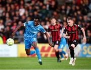 2 May 2025; James Olayinka of Waterford in action against Ross Tierney of Bohemians during the SSE Airtricity Men's Premier Division match between Bohemians and Waterford at Dalymount Park in Dublin. Photo by Michael P Ryan/Sportsfile