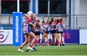 3 May 2025; Mullingar Blue players celebrate their side scoring a try during the Leinster Rugby U14 Girls Cup final match between Mullingar Blue and Portdara at Energia Park in Dublin. Photo by Tyler Miller/Sportsfile