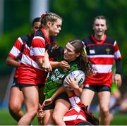 3 May 2025; Eabha Ryan of Portdara is tackled by Eva Fitzpatrick of Wicklow during the Leinster Rugby U16 Girls Plate final match between Portdara and Wicklow at Energia Park in Dublin. Photo by Tyler Miller/Sportsfile