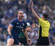 3 May 2025; James Lowe of Leinster remonstrates with referee Pierre Brousset during the Investec Champions Cup semi-final match between Leinster and Northampton Saints at the Aviva Stadium in Dublin. Photo by Seb Daly/Sportsfile