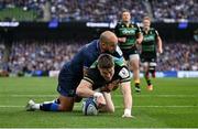 3 May 2025; Tommy Freeman of Northampton Saints dives over to score his side's first try despite the efforts of Jamison Gibson-Park of Leinster during the Investec Champions Cup semi-final match between Leinster and Northampton Saints at the Aviva Stadium in Dublin. Photo by David Fitzgerald/Sportsfile