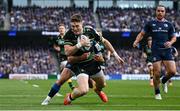 3 May 2025; Tommy Freeman of Northampton Saints dives over to score his side's first try despite the efforts of Jamison Gibson-Park of Leinster during the Investec Champions Cup semi-final match between Leinster and Northampton Saints at the Aviva Stadium in Dublin. Photo by David Fitzgerald/Sportsfile