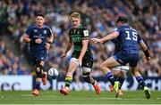 3 May 2025; Fin Smith of Northampton Saints kicks past Hugo Keenan of Leinster in the build up to their side's first try during the Investec Champions Cup semi-final match between Leinster and Northampton Saints at the Aviva Stadium in Dublin. Photo by David Fitzgerald/Sportsfile
