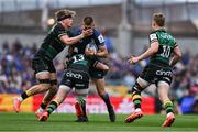 3 May 2025; Sam Prendergast of Leinster is tackled by Henry Pollock, left, and Fraser Dingwall of Northampton Saints during the Investec Champions Cup semi-final match between Leinster and Northampton Saints at the Aviva Stadium in Dublin. Photo by Brendan Moran/Sportsfile