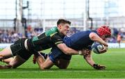 3 May 2025; Josh van der Flier of Leinster dives over to score his side's second try despite the efforts of Tommy Freeman of Northampton Saints during the Investec Champions Cup semi-final match between Leinster and Northampton Saints at the Aviva Stadium in Dublin. Photo by Brendan Moran/Sportsfile
