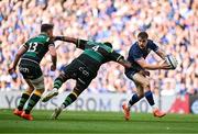3 May 2025; Garry Ringrose of Leinster is tackled by Temo Mayanavanua of Northampton Saints during the Investec Champions Cup semi-final match between Leinster and Northampton Saints at the Aviva Stadium in Dublin. Photo by Brendan Moran/Sportsfile