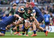 3 May 2025; Alex Mitchell of Northampton Saints is tackled by RG Snyman, left, and Josh van der Flier of Leinster during the Investec Champions Cup semi-final match between Leinster and Northampton Saints at the Aviva Stadium in Dublin. Photo by David Fitzgerald/Sportsfile