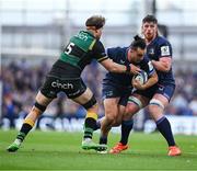 3 May 2025; James Lowe of Leinster is tackled by Alex Coles of Northampton Saints during the Investec Champions Cup semi-final match between Leinster and Northampton Saints at the Aviva Stadium in Dublin. Photo by Brendan Moran/Sportsfile