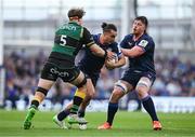 3 May 2025; James Lowe of Leinster is tackled by Alex Coles of Northampton Saints during the Investec Champions Cup semi-final match between Leinster and Northampton Saints at the Aviva Stadium in Dublin. Photo by Brendan Moran/Sportsfile