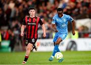 2 May 2025; James Olayinka of Waterford in action against James Clarke of Bohemians during the SSE Airtricity Men's Premier Division match between Bohemians and Waterford at Dalymount Park in Dublin. Photo by Michael P Ryan/Sportsfile