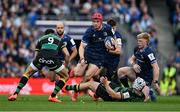 3 May 2025; Josh van der Flier of Leinster is tripped by Curtis Langdon of Northampton Saints during the Investec Champions Cup semi-final match between Leinster and Northampton Saints at the Aviva Stadium in Dublin. Photo by Brendan Moran/Sportsfile