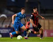 2 May 2025; Sam Glenfield of Waterford in action against James Clarke of Bohemians during the SSE Airtricity Men's Premier Division match between Bohemians and Waterford at Dalymount Park in Dublin. Photo by Michael P Ryan/Sportsfile
