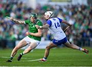 3 May 2025; William O'Donoghue of Limerick is tackled by Dessie Hutchinson of Waterford during the Munster GAA Hurling Senior Championship Round 3 match between Waterford and Limerick at Walsh Park in Waterford. Photo by Tom Beary/Sportsfile