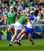 3 May 2025; Stephen Bennett of Waterford is fouled by Diarmaid Byrnes of Limerick for which he received a yellow card during the Munster GAA Hurling Senior Championship Round 3 match between Waterford and Limerick at Walsh Park in Waterford. Photo by Tom Beary/Sportsfile