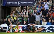 3 May 2025; Northampton Saints supporters celebrate as Tommy Freeman of Northampton Saints scores thier side's fourth try during the Investec Champions Cup semi-final match between Leinster and Northampton Saints at the Aviva Stadium in Dublin. Photo by David Fitzgerald/Sportsfile