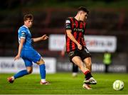 2 May 2025; James Clarke of Bohemians in action against Sam Glenfield of Waterford during the SSE Airtricity Men's Premier Division match between Bohemians and Waterford at Dalymount Park in Dublin. Photo by Michael P Ryan/Sportsfile