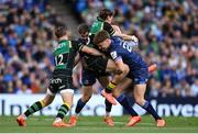 3 May 2025; James Ramm of Northampton Saints is tackled by Jordie Barrett, right, and Garry Ringrose of Leinster during the Investec Champions Cup semi-final match between Leinster and Northampton Saints at the Aviva Stadium in Dublin. Photo by David Fitzgerald/Sportsfile