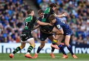 3 May 2025; James Ramm of Northampton Saints is tackled by Jordie Barrett, right, and Garry Ringrose of Leinster during the Investec Champions Cup semi-final match between Leinster and Northampton Saints at the Aviva Stadium in Dublin. Photo by David Fitzgerald/Sportsfile