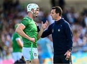 3 May 2025; Kyle Hayes of Limerick with Limerick selector Paul Kinnerk before the Munster GAA Hurling Senior Championship Round 3 match between Waterford and Limerick at Walsh Park in Waterford. Photo by Piaras Ó Mídheach/Sportsfile