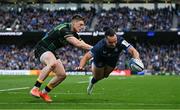 3 May 2025; James Lowe of Leinster dives over to score his side's fifth try during the Investec Champions Cup semi-final match between Leinster and Northampton Saints at the Aviva Stadium in Dublin. Photo by Brendan Moran/Sportsfile