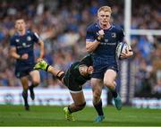3 May 2025; Tommy O'Brien of Leinster is tackled by Juarno Augustus of Northampton Saints during the Investec Champions Cup semi-final match between Leinster and Northampton Saints at the Aviva Stadium in Dublin. Photo by Brendan Moran/Sportsfile
