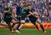 3 May 2025; Jordie Barrett of Leinster is tackled by Henry Pollock of Northampton Saints during the Investec Champions Cup semi-final match between Leinster and Northampton Saints at the Aviva Stadium in Dublin. Photo by Brendan Moran/Sportsfile